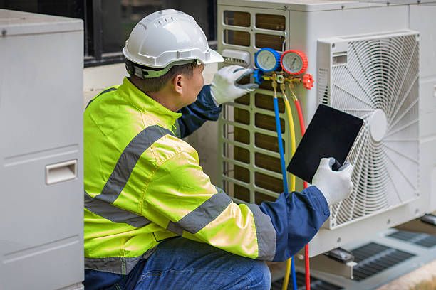 Professional Heat Pump Repair technician working in Mendon, IL